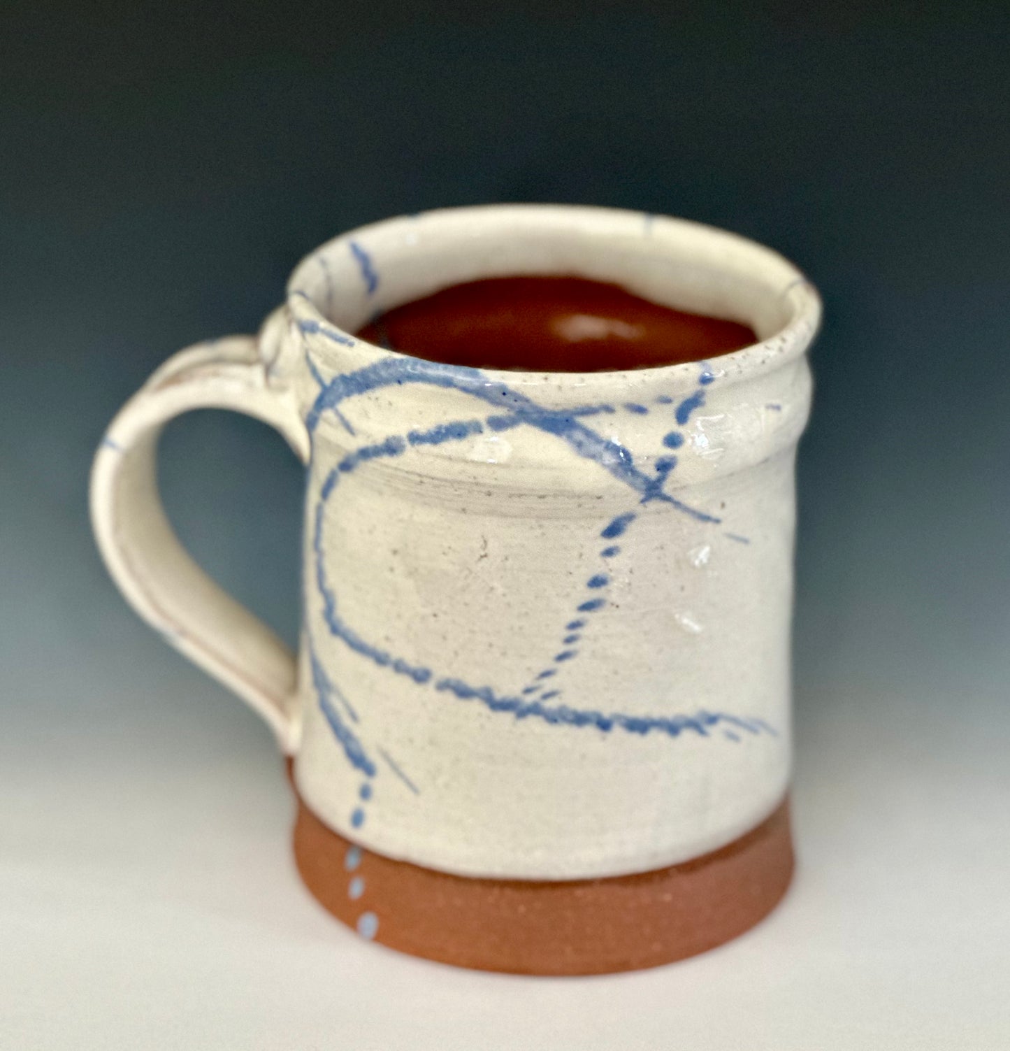 White and Blue Slipware Mugs