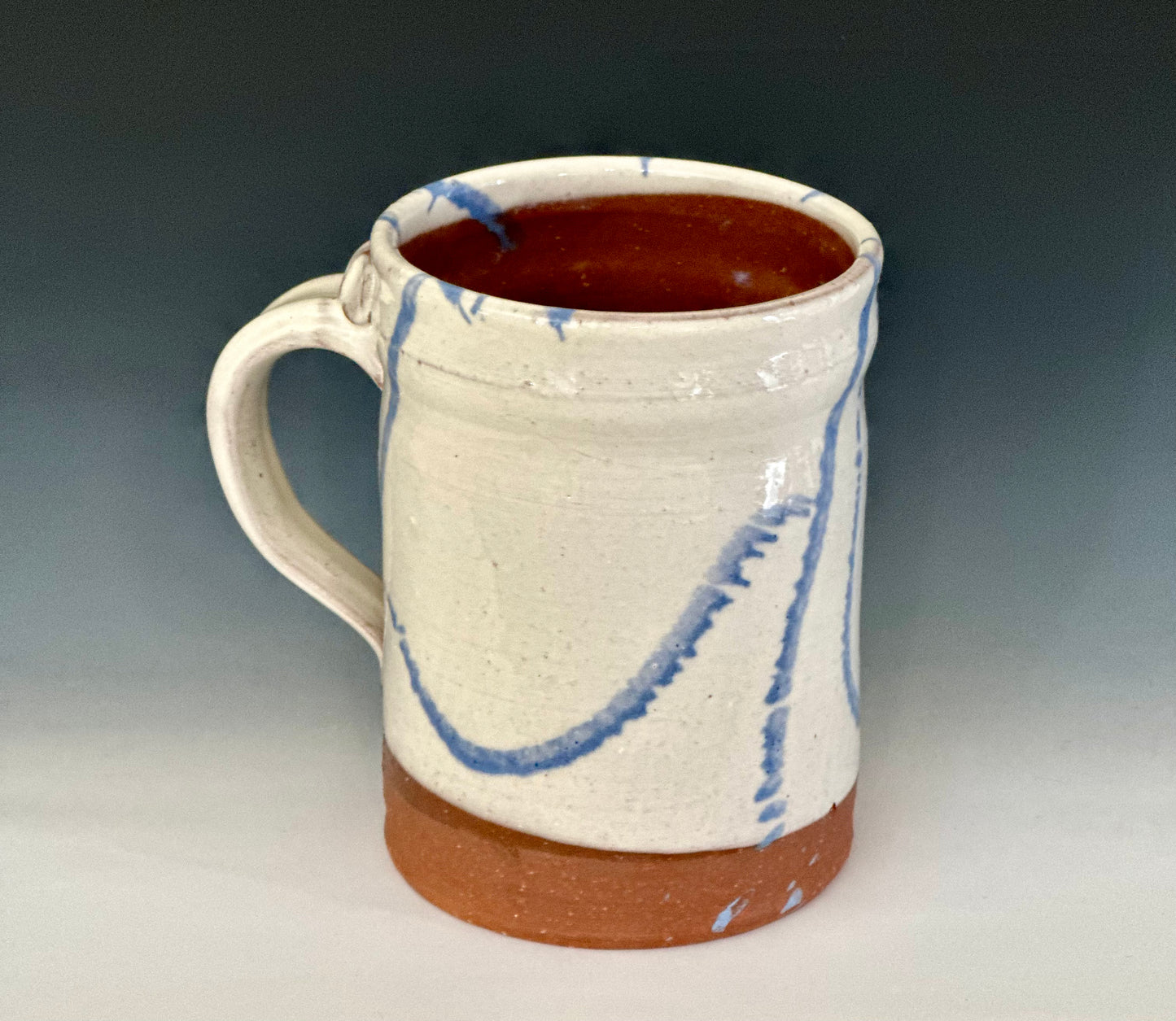 White and Blue Slipware Mugs