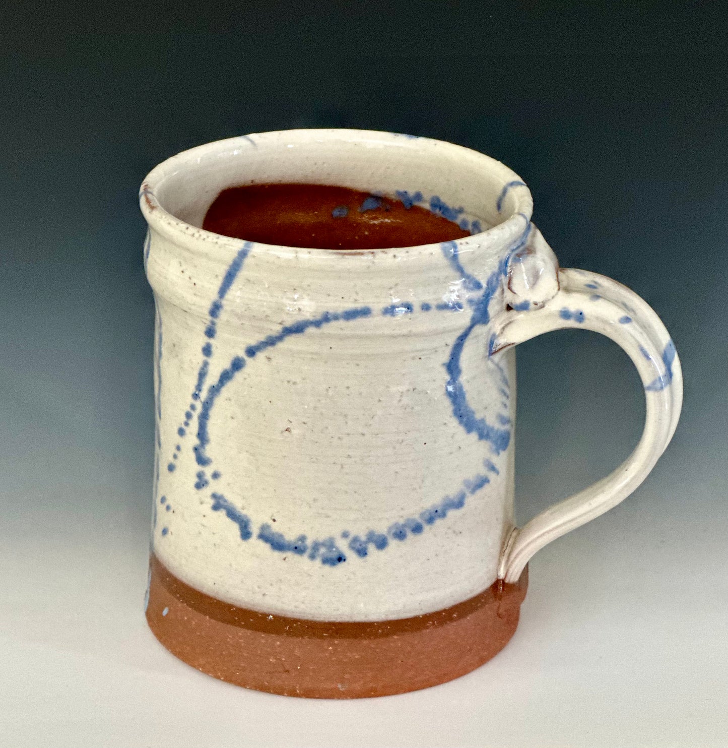 White and Blue Slipware Mugs