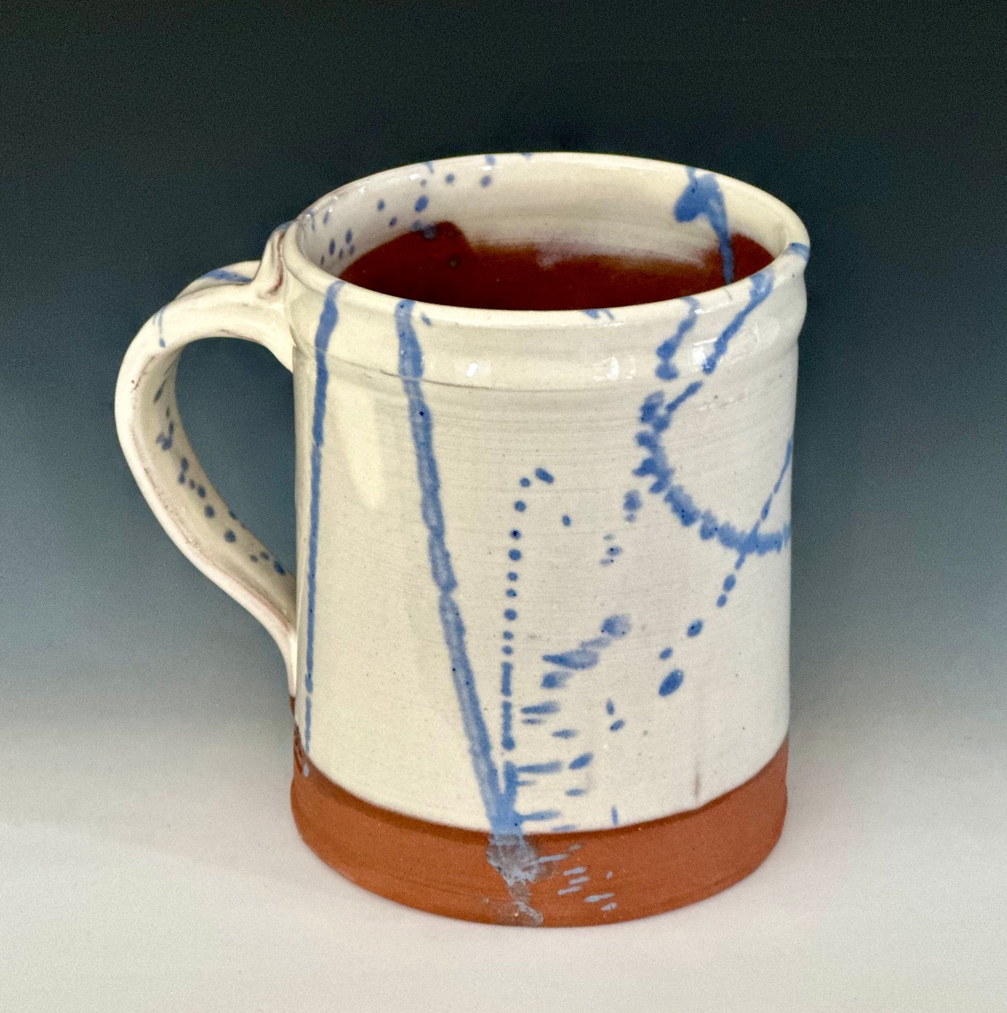 White and Blue Slipware Mugs